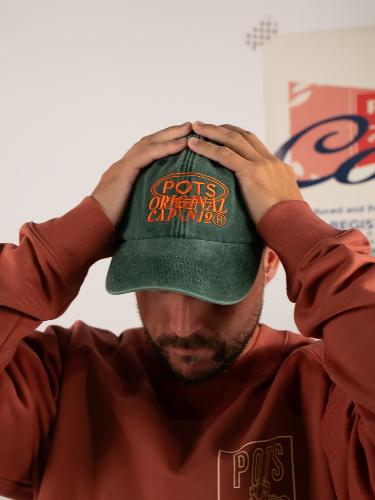 GREEN WORN CAP