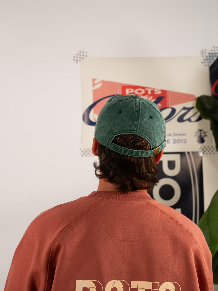 GREEN WORN CAP