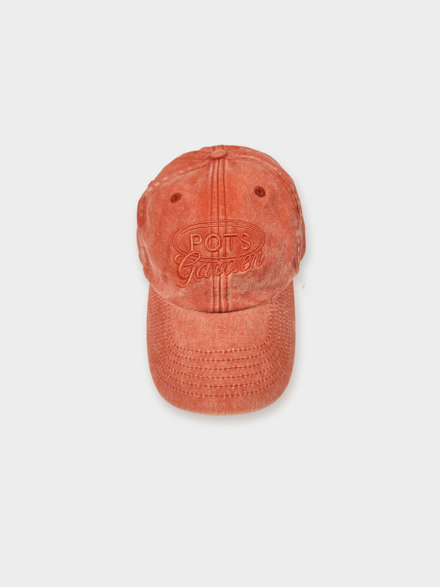 ORANGE WORN CAP