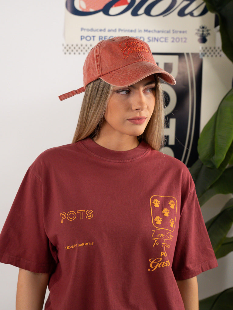 ORANGE WORN CAP