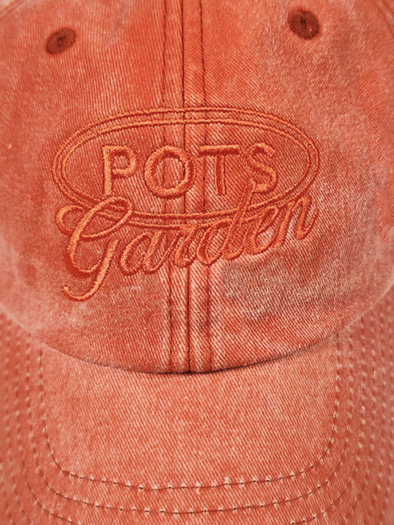 ORANGE WORN CAP