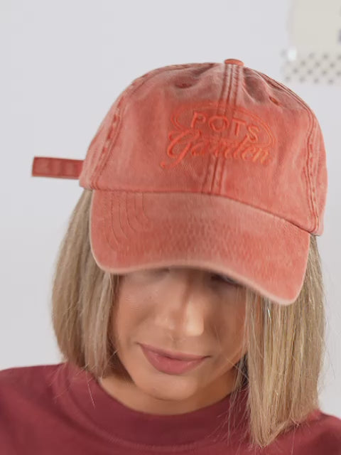 ORANGE WORN CAP